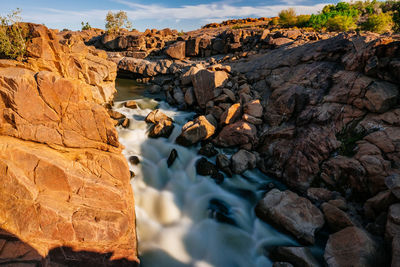 Scenic view of rocks in sea