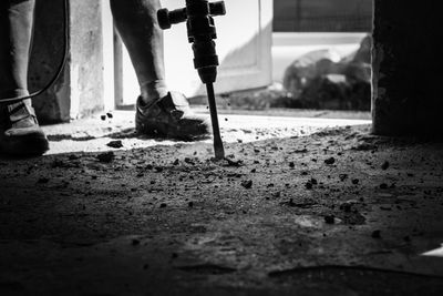 Low section of man working at construction site