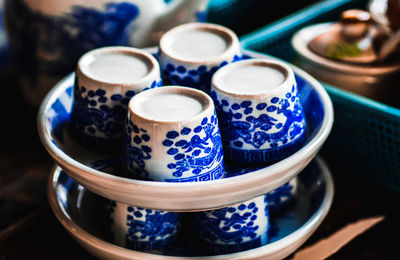 Close-up of cup and coffee on table