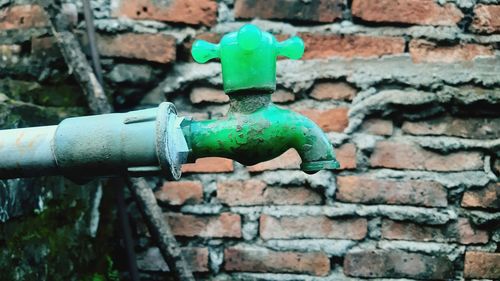 Close-up of pipe on wall