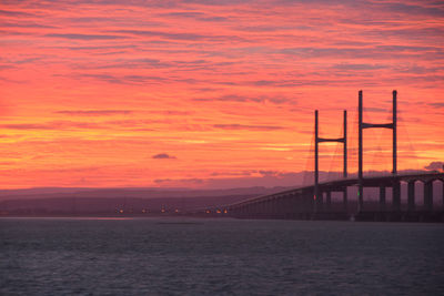 View of suspension bridge over sea