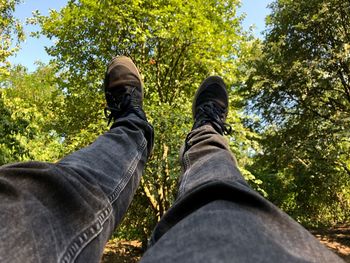 Low section of man wearing shoes