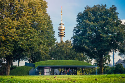 Built structure with trees in foreground