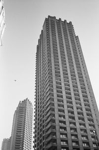 Low angle view of modern buildings against clear sky