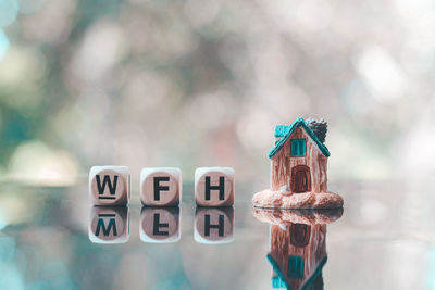 Close-up of toy hanging on clothesline