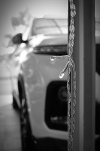 Close-up of chain hanging on metal