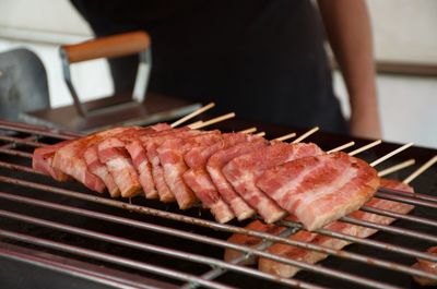 Close-up of meat on barbecue grill