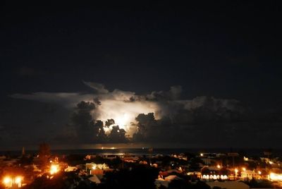Illuminated cityscape at night
