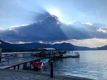 Pier over lake against sky