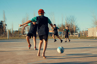 Children playing football