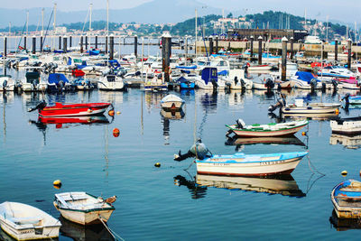 High angle view of boats moored in harbor