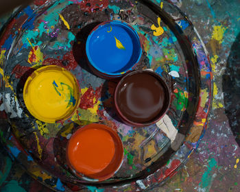 High angle view of paints