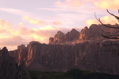 Panoramic view of rock formations against sky during sunset