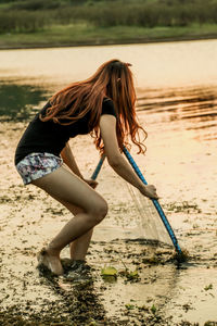 Side view of woman on beach