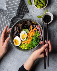 Directly above shot of woman having food at table