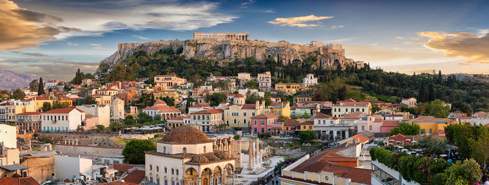 Monastiraki square and plaka against sky during sunset