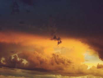 Low angle view of clouds in sky during sunset