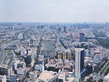 Aerial view of cityscape against sky