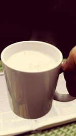 Close-up of coffee cup on table