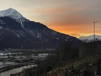 Scenic view of mountains against sky during sunset