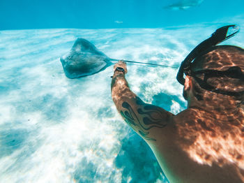 Man swimming in sea