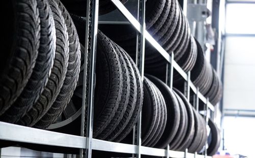 Low angle view of tires in warehouse