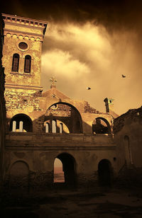 Low angle view of old building against sky