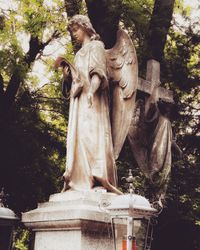 Statue of angel in park