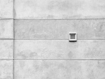 Information sign on wall of building