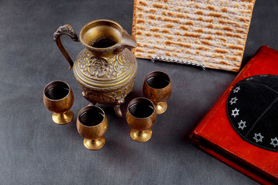 High angle view of coffee cups on table