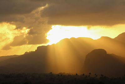 Scenic view of mountains at sunset