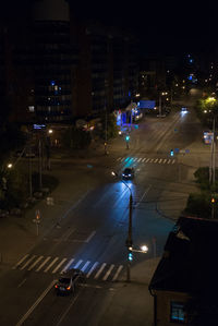 High angle view of illuminated street at night