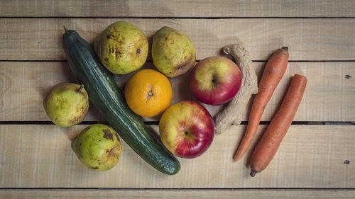 Directly above shot of fruits and vegetables on table