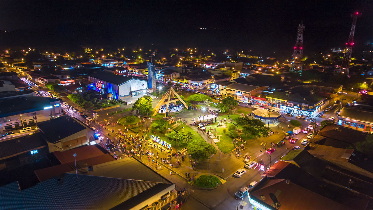 HIGH ANGLE VIEW OF ILLUMINATED CITYSCAPE