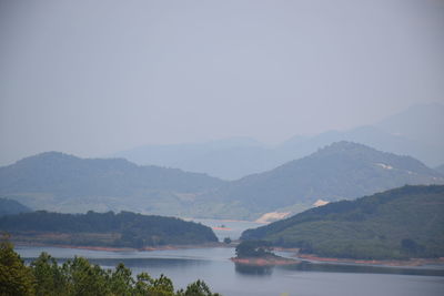 Scenic view of river and mountains