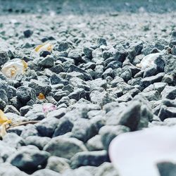 Close-up of stones on beach