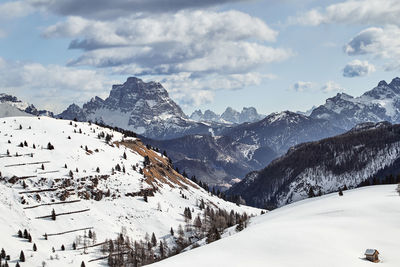 A wonderful view over the wide valleys and mountains of the italian dolomites in late winter