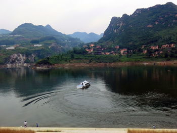 Scenic view of calm lake against sky
