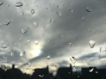 Close-up of raindrops on glass window