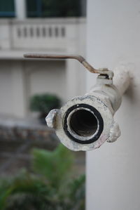 Close-up of railing against blurred background