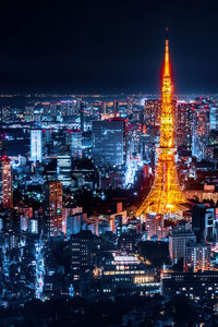 Illuminated buildings in city at night