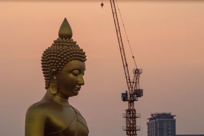 The giant golden buddha in wat paknam phasi charoen temple in phasi charoen district