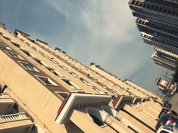 Low angle view of buildings in city against sky