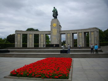 Statue against cloudy sky