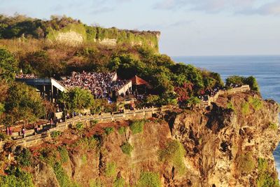 People at amphitheater on mountain 