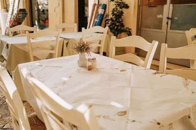 Empty chairs and tables at home