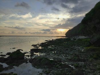 Scenic view of sea against sky at sunset