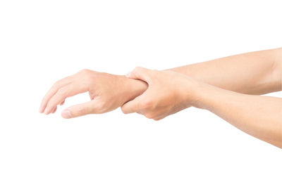 Close-up of human hand against white background