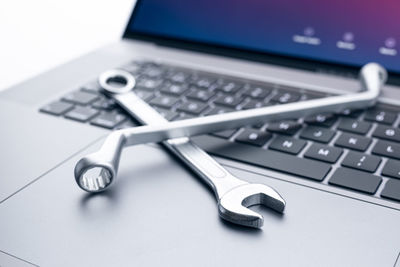 Close-up of laptop keyboard on table