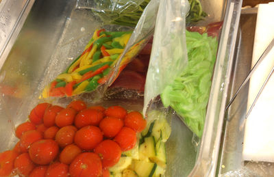 High angle view of vegetables in glass container